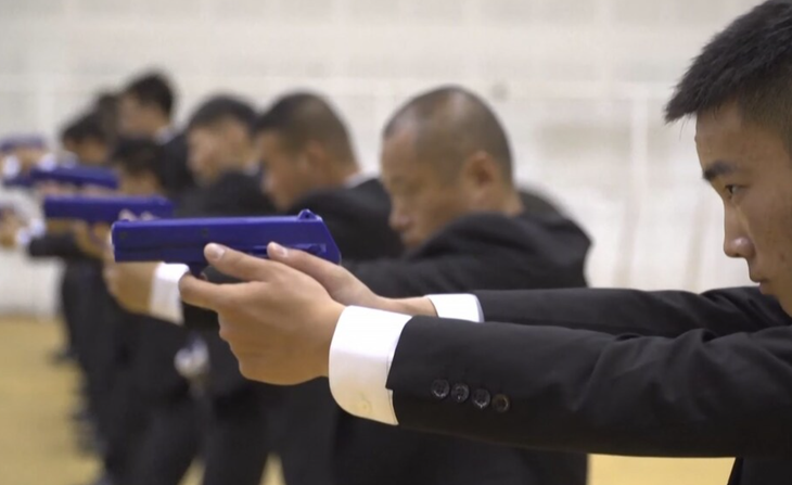 Học viên tại trường đào tạo vệ sĩ duy nhất ở Trung Quốc - Ảnh: AFP