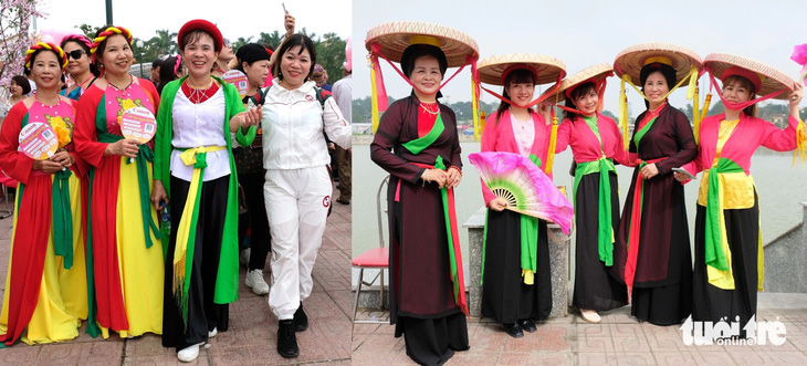 Nhiều khách đi trẩy hội Lim thuê trang phục để hóa thành những liền chị, chụp ảnh lưu niệm cùng các nghệ nhân đất quan họ - Ảnh: ĐẬU DUNG