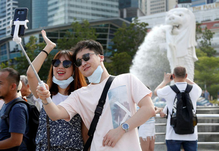Du khách Trung Quốc tại Singapore - Ảnh minh họa: Reuters