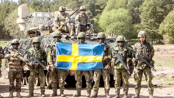 Khi gia nhập NATO, Thụy Điển sẽ được hưởng sự bảo vệ toàn diện của liên minh theo điều khoản phòng thủ tập thể (điều 5) - Ảnh: AFP