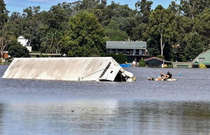 Lũ lụt do ảnh hưởng La Nina tại Windsor, ngoại ô Sydney, Úc, ngày 24-3-2021 - Ảnh: AFP/TTXVN