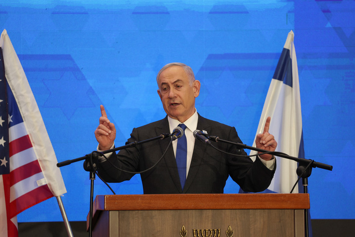 Thủ tướng Israel Benjamin Netanyahu phát biểu hôm 18-2 - Ảnh: REUTERS