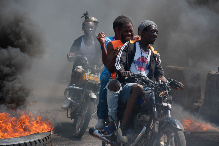 Cướp bóc và bạo lực đang bao trùm thủ đô  Port-au-Prince của Haiti - Ảnh: AFP