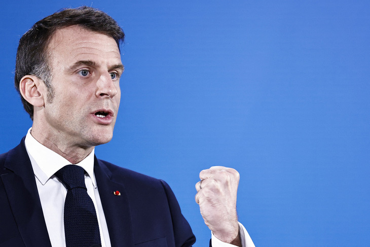 Tổng thống Pháp Emmanuel Macron phát biểu tại họp báo sau hội nghị thượng đỉnh EU ngày 22-3 - Ảnh: AFP