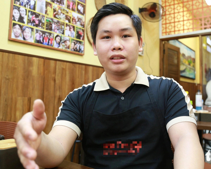 Anh Trần Lê Nguyên Vũ - quản lý nhà hàng B.T - Ảnh: ĐOÀN NHẠN