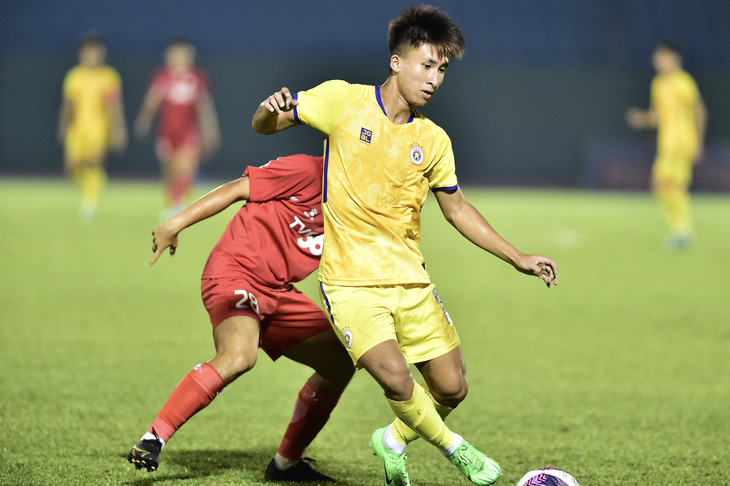 U19 Hà Nội (áo vàng) trong trận chung kết - Ảnh: VFF