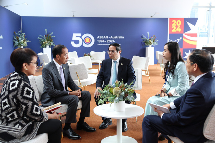 Thủ tướng Phạm Minh Chính gặp Tổng thống Indonesia Joko Widodo - Ảnh: DƯƠNG GIANG