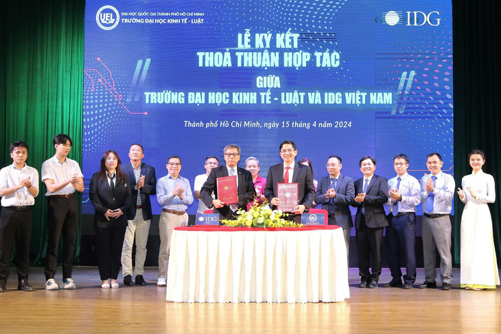 IDG Việt Nam và Trường ĐH Kinh tế - Luật (ĐH Quốc gia TP.HCM) ký kết hợp tác về khoa học, công nghệ - Ảnh: UEL
