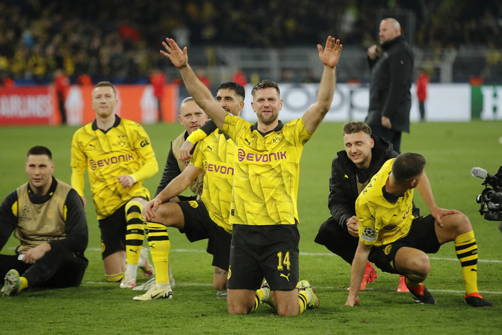 Niềm vui của Dortmund sau khi loại Atletico Madrid khỏi Champions League - Ảnh: REUTERS
