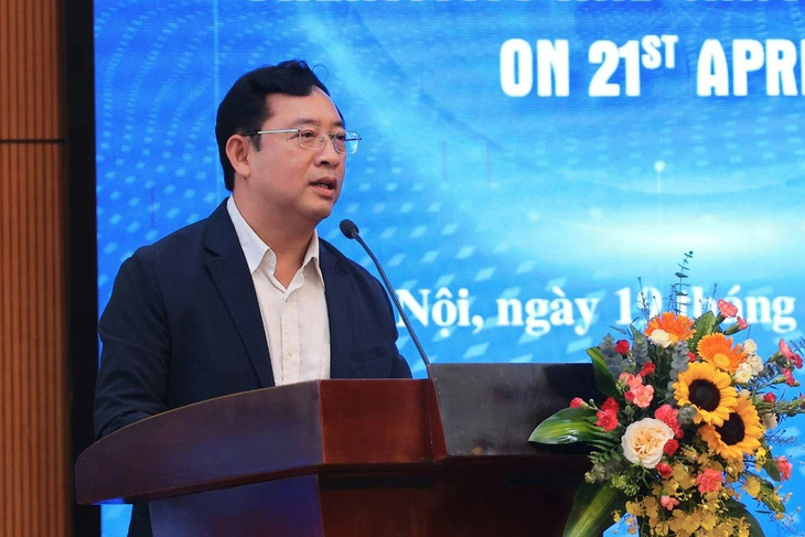Ông Phạm Hồng Quất - cục trưởng Cục Phát triển thị trường và doanh nghiệp khoa học và công nghệ - trình bày tham luận tại hội thảo - Ảnh: M.H.