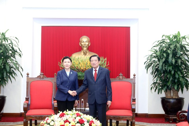Ông Phan Đình Trạc và Bộ trưởng Bộ Tư pháp Trung Quốc Hạ Vinh tại buổi tiếp - Ảnh: ĐẶNG PHƯỚC