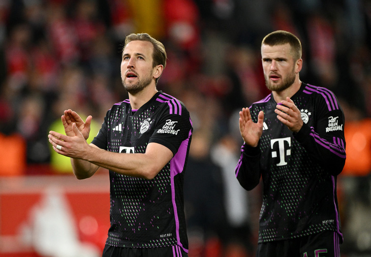 Harry Kane (trái) đạt hiệu suất ghi bàn cao ngay mùa đầu đến với Bayern - Ảnh: REUTERS