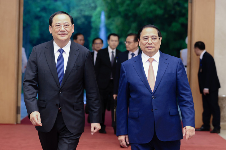 Thủ tướng Lào Sonexay Siphandone và Thủ tướng Phạm Minh Chính tại trụ sở Chính phủ chiều 22-4 - Ảnh: VGP