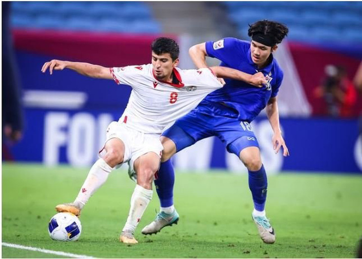 U23 Thái Lan (áo xanh) sớm xách vali về nước sau thất bại trước Tajikistan - Ảnh: AFC