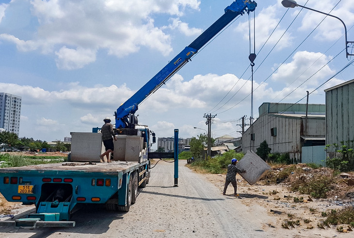 Tập đoàn Thuận An đã thi công trở lại tại gói thầu dự án Tham Lương - Bến Cát - rạch Nước Lên - Ảnh: GIAI THỤY
