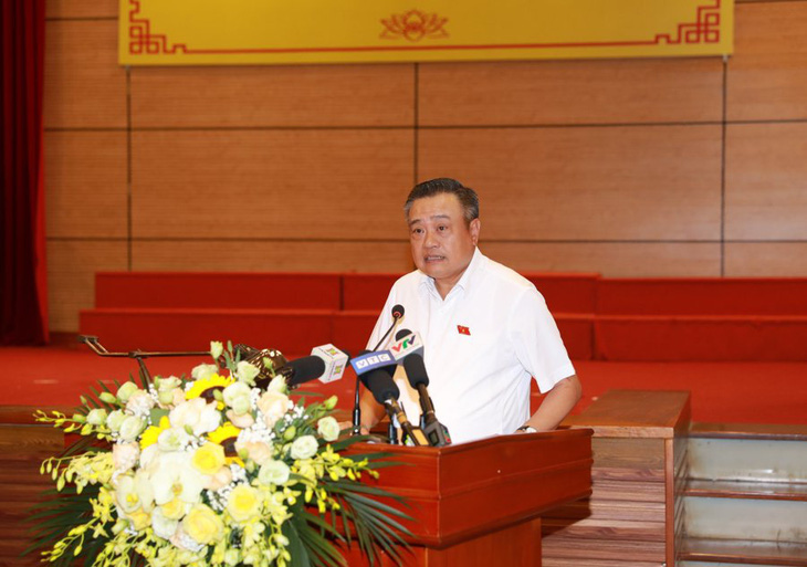 Chủ tịch UBND TP Hà Nội Trần Sỹ Thanh trả lời kiến nghị cử tri - Ảnh: UBND TP