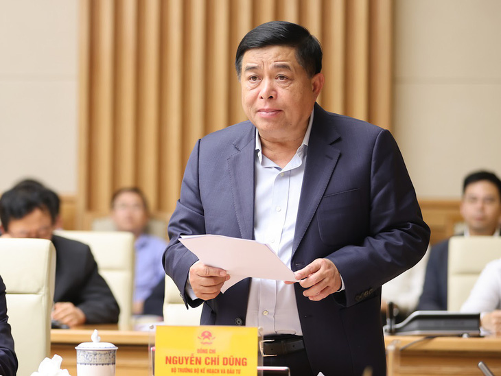 Bộ trưởng Nguyễn Chí Dũng phát biểu tại hội nghị chiều 24-4 ở Hà Nội - Ảnh: H.C.