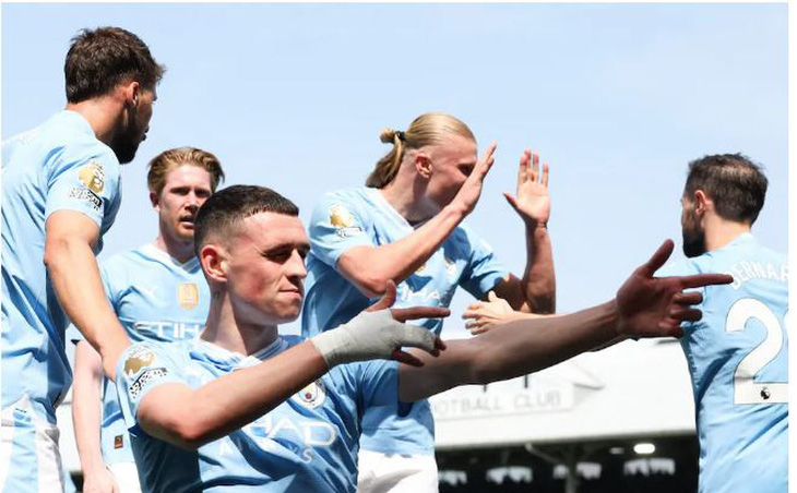 Man City vươn lên dẫn đầu bảng xếp hạng Premier League, sau chiến thắng trước Fulham - Ảnh: Getty Images