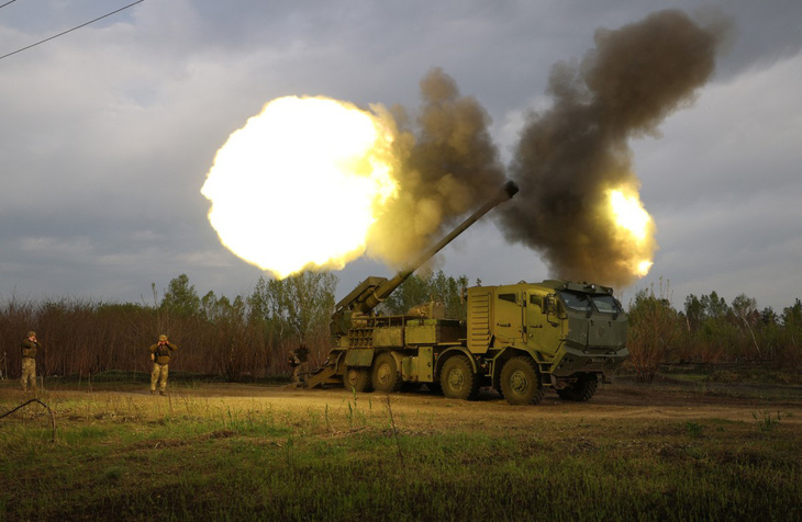Lực lượng Ukraine chiến đấu ở vùng Kharkov ngày 21-4 - Ảnh: AFP