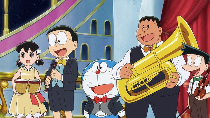 Ban nhạc của nhạc trưởng Doraemon: Shizuka bộ gõ, Nobita kèn sáo, Jaian kèn tuba và Suneo violin - Ảnh: Toho