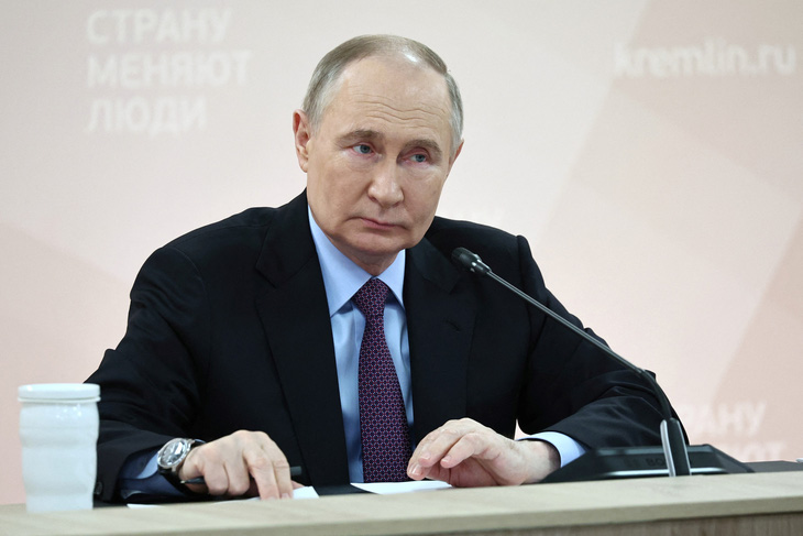 Tổng thống Vladimir Putin ký sắc lệnh cho phép lấy tài sản Mỹ bồi thường cho tài sản Nga bị tịch thu - Ảnh: REUTERS