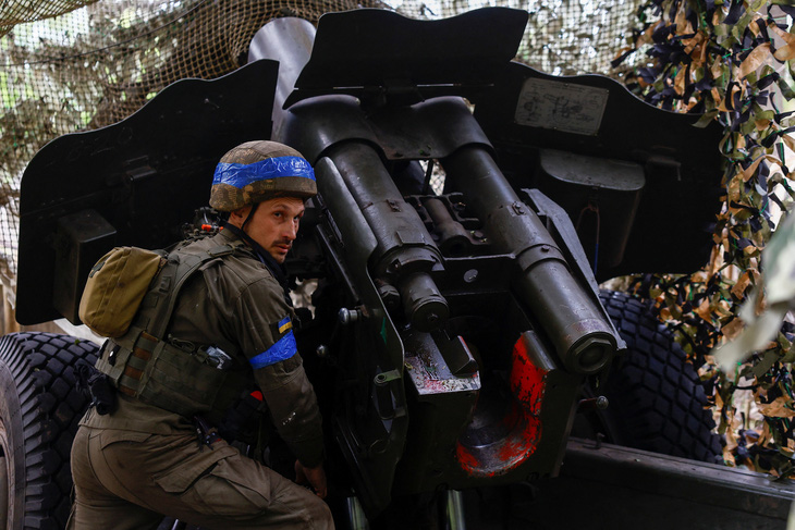 Lực lượng Ukraine chiến đấu ở Kharkov - Ảnh: REUTERS
