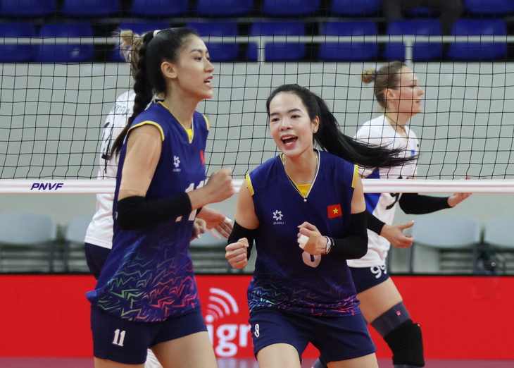 Niềm vui chiến thắng của tuyển bóng chuyền nữ Việt Nam - Ảnh: AVC