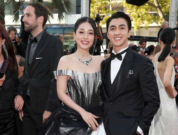 Diễn viên Bình An và á hậu Phương Nga rạng rỡ trên thảm đỏ Cannes ngày thứ 11 - Ảnh: Getty