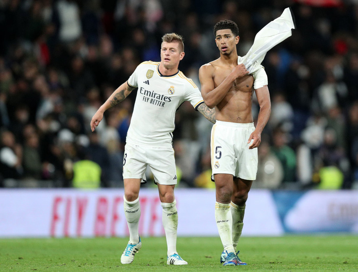 Những ngôi sao của Real Madrid như Kroos (trái) hay Bellingham bị bào mòn thể lực trước thềm Euro 2024 - Ảnh: REUTERS