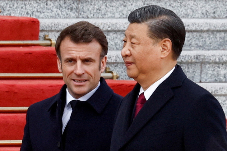 Chủ tịch Trung Quốc Tập Cận Bình tiếp đón Tổng thống Pháp Emmanuel Macron sang thăm vào tháng 4-2023 - Ảnh: REUTERS