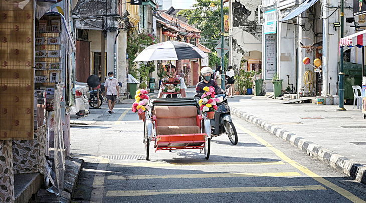 Xe xích lô chở khách tại Malacca - Ảnh: SOUTHEAST ASIA GLOBE