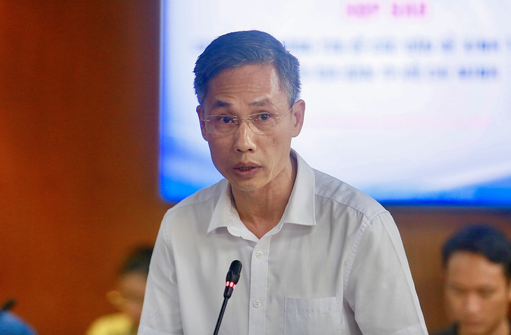 Ông Đinh Thiên Tân - trưởng phòng quản lý vận hành, Sở Xây dựng TP.HCM - tại họp báo - Ảnh: CHÂU TUẤN