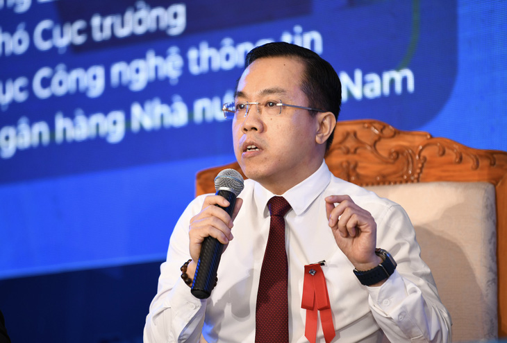 Ông Lê Hoàng Chính Quang - phó cục trưởng Cục Công nghệ thông tin, Ngân hàng Nhà nước - Ảnh: QUANG ĐỊNH