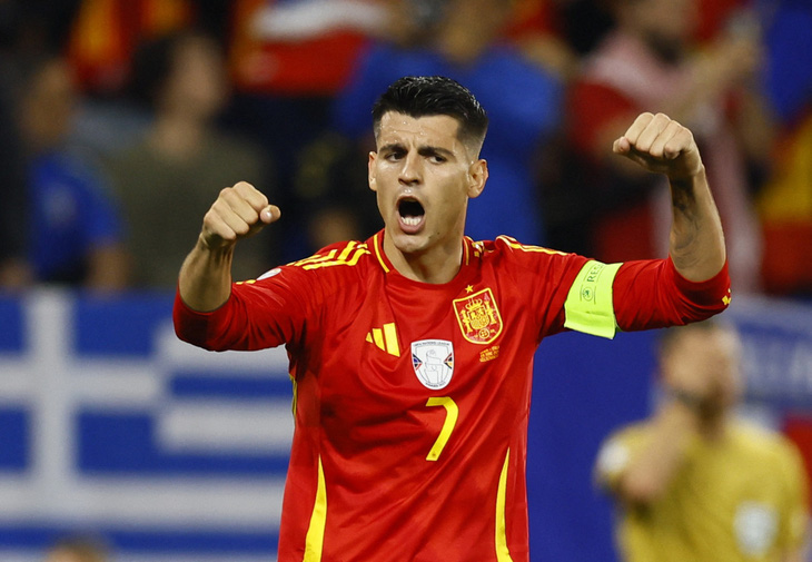 Niềm vui của Morata sau khi góp công cào chiến thắng của Tây Ban Nha - Ảnh; REUTERS