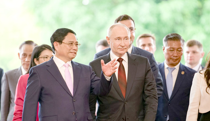 Thủ tướng Phạm Minh Chính đón tiếp Tổng thống Liên bang Nga Vladimir Putin - Ảnh: NAM TRẦN