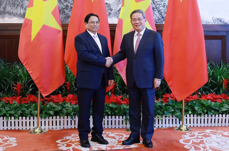 Thủ tướng Trung Quốc Lý Cường tiếp đón và hội đàm với Thủ tướng Phạm Minh Chính hôm 24-6 - Ảnh: D.GIANG