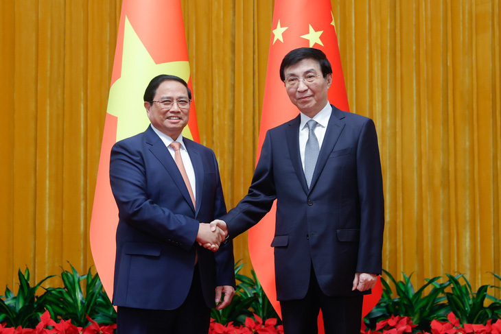 Thủ tướng Phạm Minh Chính hội kiến Chủ tịch Chính hiệp toàn quốc Trung Quốc Vương Hộ Ninh - Ảnh: ĐOÀN BẮC