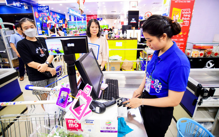 Visa vừa công bố hợp tác với 3 ví điện tử phổ biến tại Việt Nam là MoMo, VNPAY và ZaloPay nhằm mang đến trải nghiệm thanh toán thuận tiện hơn cho chủ thẻ  - Ảnh: QUANG ĐỊNH