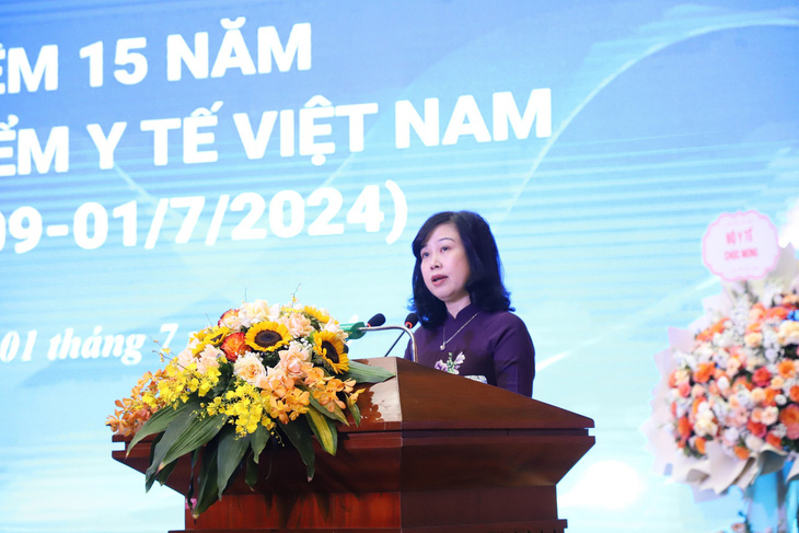 Bà Đào Hồng Lan chia sẻ tại lễ kỷ niệm 15 năm Ngày Bảo hiểm y tế Việt Nam - Ảnh: N.NHIÊN