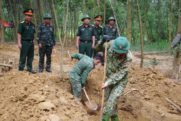 Quy tập 7 hài cốt liệt sĩ ở rừng tràm, vườn nhà dân- Ảnh 1.