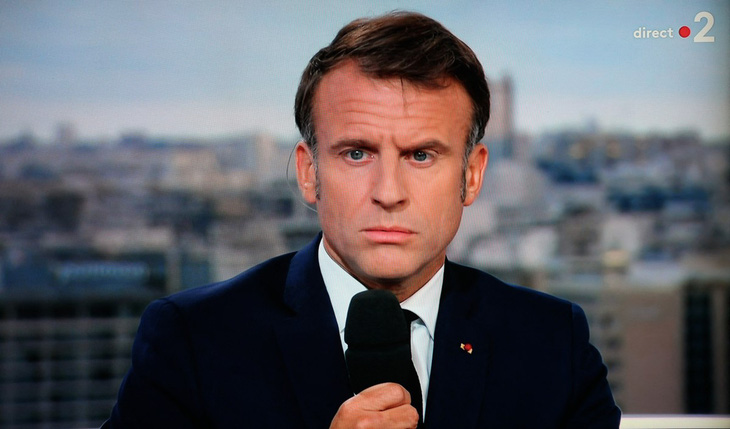 Tổng thống Pháp Emmanuel Macron phát biểu trên truyền hình ngày 23-7 - Ảnh: AFP