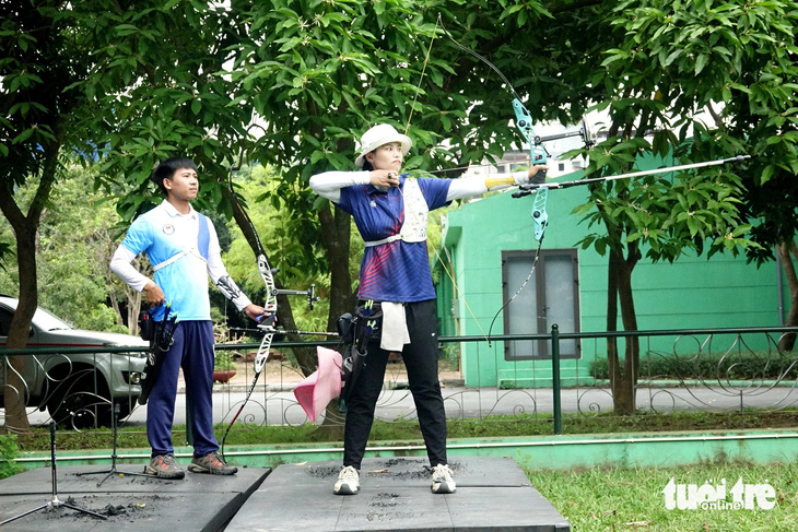 Cung thủ Ánh Nguyệt và Quốc Phong xuất trận ở Olympic Paris 2024- Ảnh 1.