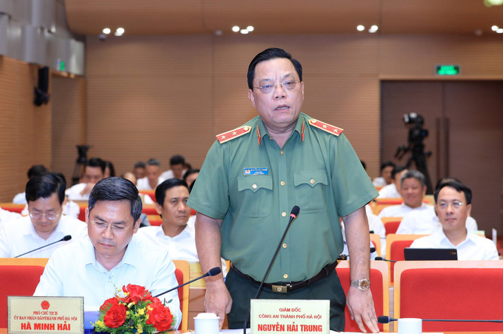 Trung tướng Nguyễn Hải Trung - giám đốc Công an TP Hà Nội - trả lời chất vấn - Ảnh: HĐND TP Hà Nội