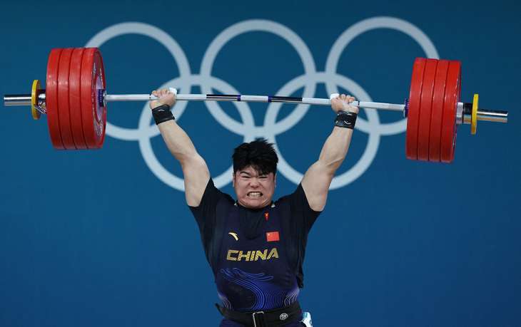 Lực sĩ người Trung Quốc Liu Huanhua đã giành huy chương vàng hạng cân 102kg nam - Ảnh: Reuters