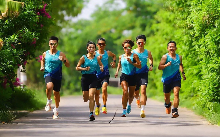 Những runner nữ xinh đẹp trên đường chạy GreenUP Marathon Long An 2024- Ảnh 13.