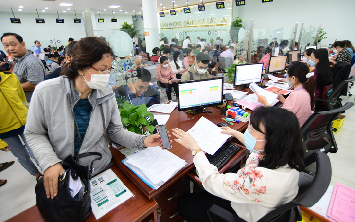 Trung tâm phục vụ hành chính công TP.HCM: Một đầu mối, dân đến cửa nào cũng được - Ảnh 5.