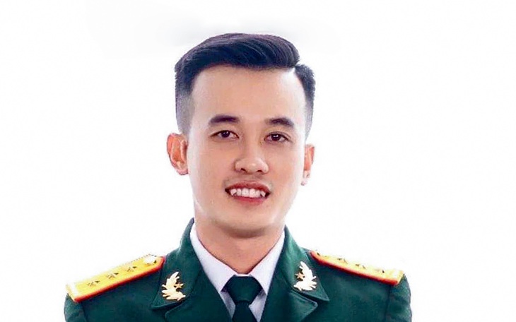 Truy tặng Huân chương Bảo vệ Tổ quốc cho đại úy Nguyễn Đình Khiêm - Ảnh 2.