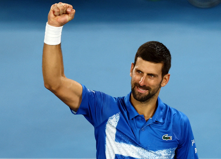 Djokovic san bằng kỷ lục số trận Grand Slam của Federer - Ảnh 1.