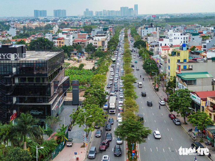 Dân hối hả trở lại Hà Nội dù chưa hết nghỉ Tết, cửa ngõ kẹt cứng - Ảnh 14.