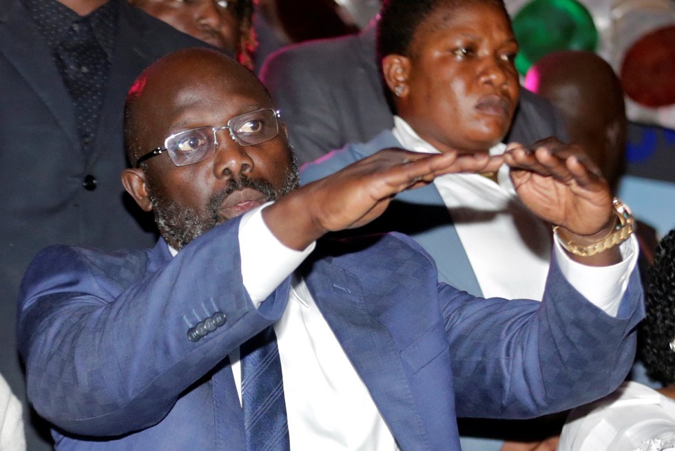 George Weah, từ đứa trẻ đường phố thành tổng thống - Ảnh 1. George Weah, từ đứa trẻ đường phố thành tổng thống - Ảnh 1.